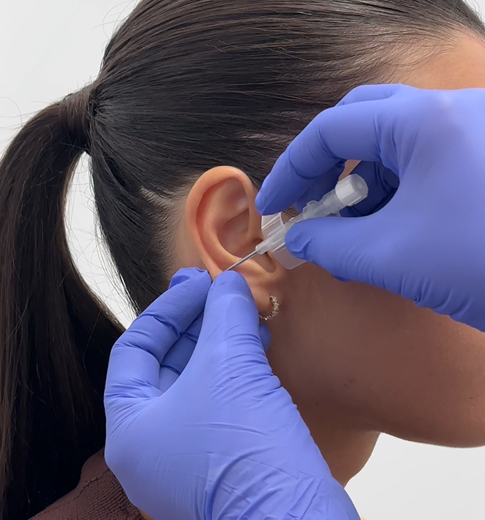 כיצד להימנע מזיהום לאחר ניקוב חדש באוזן